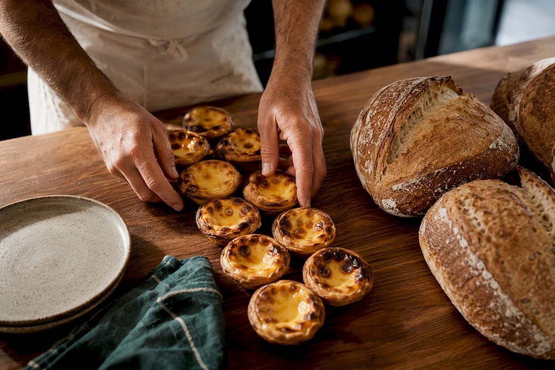 Portuguese pastries and Italian bread in bakery